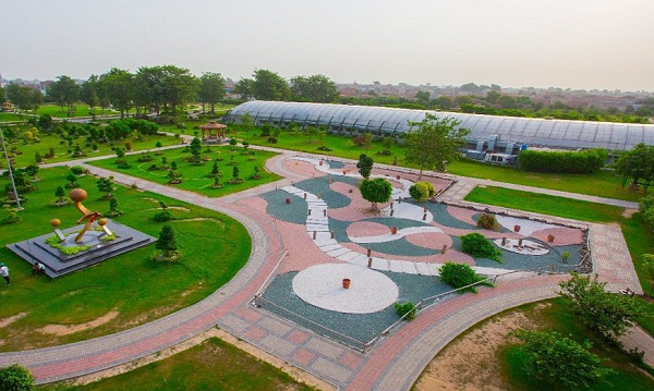 Jallo Park, a serene nature reserve with lush greenery, a tranquil lake, and recreational facilities, offering a peaceful escape within Lahore, Pakistan.